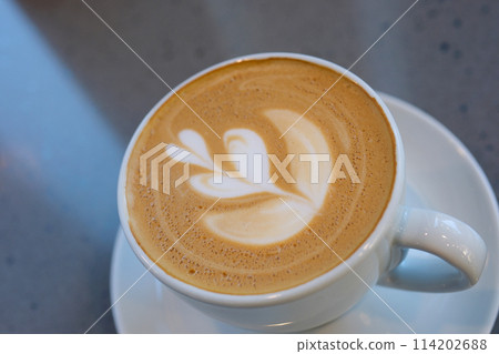 Cappuccino coffee cup with latte art isolated cup of coffee with tree pattern in a white cup 114202688
