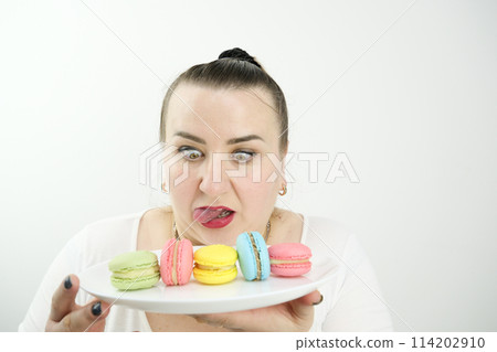 banner pastry shop cooking show courses training to cook sweet dessert satisfied and happy woman eating macaroons ad sweets goodies pleasant life pleasure buzz joy smile overweight model size plus 114202910