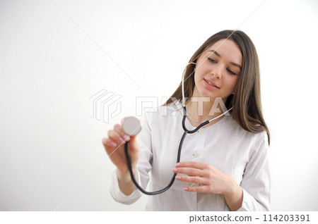 Young Doctor with stethoscope. Isolated on white background. Studio lighting. Concept for healthy 114203391