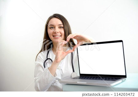 doctor nurse computer with white screen blank shows with hands heart smiling nutritional supplements good medicine mutual help excellent treatment medicine product advertisement on white background 114203472