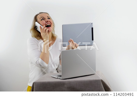 Woman sit on sofa put pc on lap clenched fists scream with joy while read great news on laptop. Gambler celebrate online auction bet victory. Got incredible offer sincere emotions of happiness concept 114203491