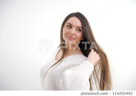 Hispanic woman getting a massage at the spa 114203492