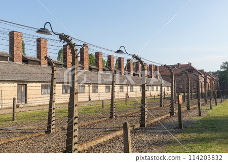 A barbed wire fence around the Auschwitz-Birkenau concentration camp in Poland A barbed wire fence around the Auschwitz-Birkenau concentration camp in Poland 114203832