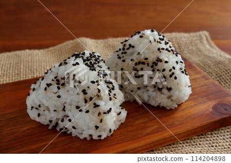 Black sesame rice balls on table background 114204898