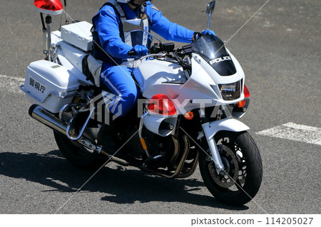 A police motorcycle on patrol 114205027