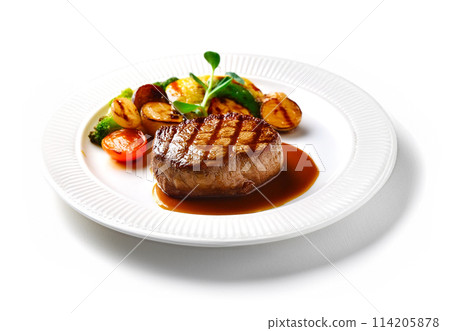 Grilled beef steak and plate of colorful vegetables isolated on white background 114205878