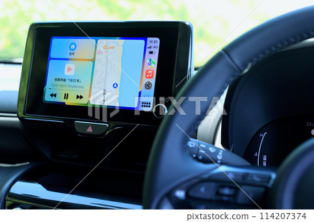 Car navigation screen seen from inside the car Car navigation screen seen from inside the car 114207374