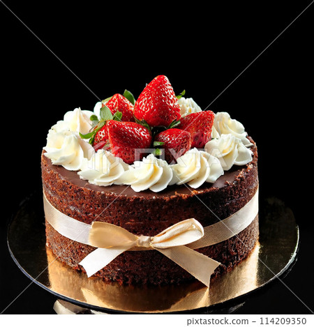 Gorgeous chocolate and strawberry decoration on a black background 114209350