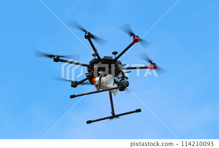 A drone with a loudspeaker in flight (calling for evacuation from a tsunami: disaster prevention training) A drone with a loudspeaker in flight (calling for evacuation from a tsunami: disaster prevention training) 114210093