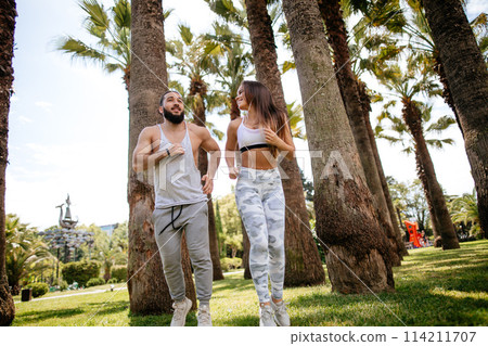 Young couple running Young couple running 114211707