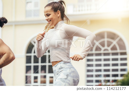 fitness, sport, people and lifestyle concept - happy couple with earphones running outdoors 114212177
