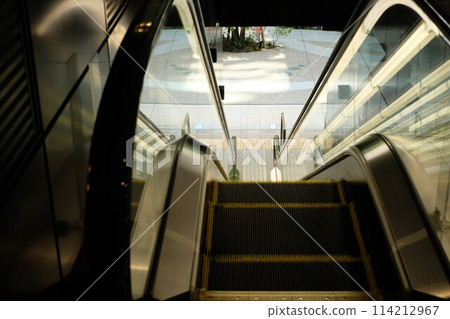Escalator in a building 114212967