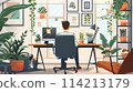 Man in cozy home office surrounded by plants 114213179