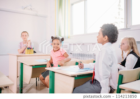 school children participating actively in class. Education, learning, high school school children participating actively in class. Education, learning, high school 114213850