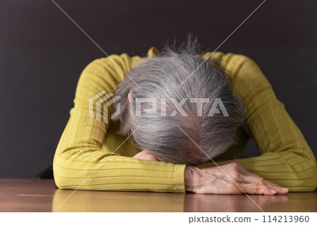 Senior woman, feeling unwell, sleeping, worried Senior woman, feeling unwell, sleeping, worried 114213960