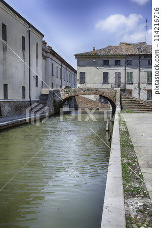 Walking among the picturesque canals of Comacchio, Italy 114216716