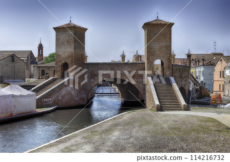 View over the Trepponti Bridge, iconic landmark in Comacchio, Italy View over the Trepponti Bridge, iconic landmark in Comacchio, Italy 114216732