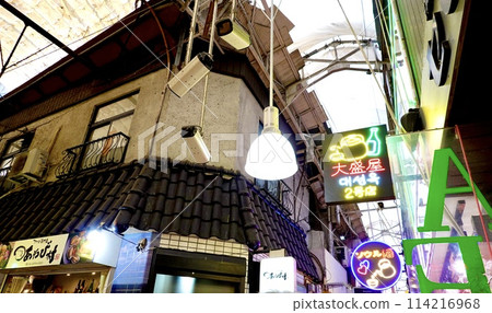 A scene with energetic signs in the arcade of Tsuruhashi Shopping Street, Higashinari Ward, Osaka City 114216968