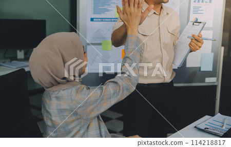 Finance manager meeting discussing company growth project success financial statistics, professional investor working start up project for strategy plan with document, laptop and digital tablet. Finance manager meeting discussing company growth project success financial statistics, professional investor working start up project for strategy plan with document, laptop and digital tablet. 114218817