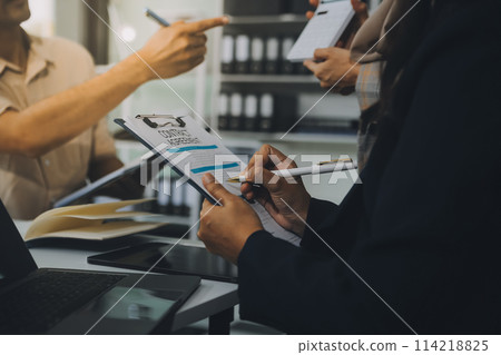 Finance manager meeting discussing company growth project success financial statistics, professional investor working start up project for strategy plan with document, laptop and digital tablet. 114218825