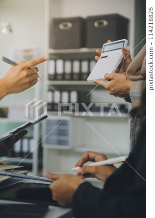 Finance manager meeting discussing company growth project success financial statistics, professional investor working start up project for strategy plan with document, laptop and digital tablet. Finance manager meeting discussing company growth project success financial statistics, professional investor working start up project for strategy plan with document, laptop and digital tablet. 114218826