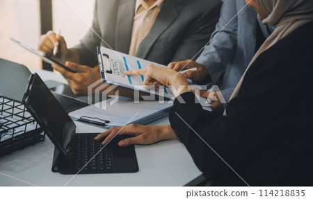 Finance manager meeting discussing company growth project success financial statistics, professional investor working start up project for strategy plan with document, laptop and digital tablet. 114218835