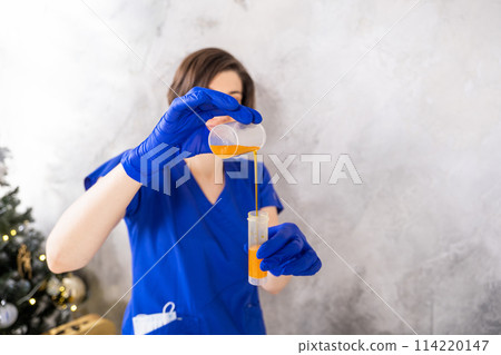 Close-up of a doctor gloves working in a testing laboratory 114220147