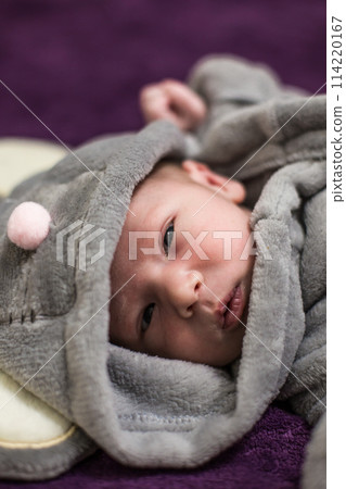 One month old baby girl on soft blanket One month old baby girl on soft blanket 114220167
