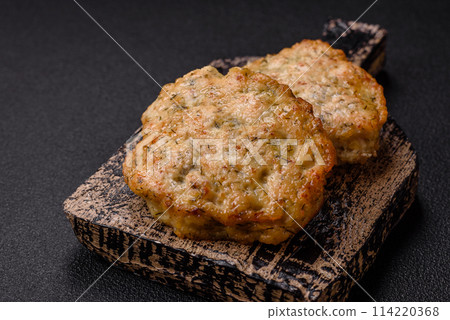 Delicious fried minced chicken cutlets with salt, spices and herbs 114220368