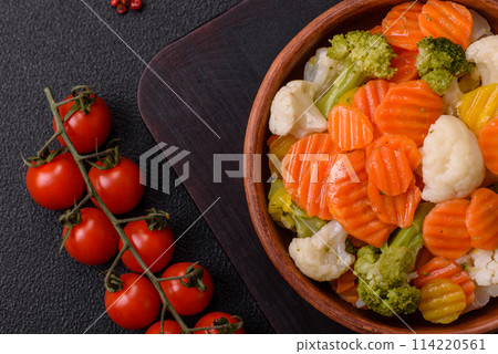 Delicious fresh vegetables broccoli, cauliflower, carrots steamed with salt Delicious fresh vegetables broccoli, cauliflower, carrots steamed with salt 114220561