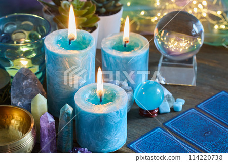 Fortune telling. Mystical Still Life with Candles, Crystals and Tarot 114220738