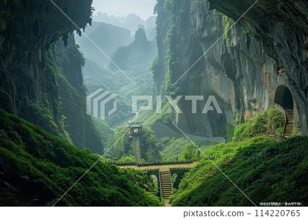 Mystical Mountain Landscape with Stone Bridge Amidst Lush Greenery 114220765
