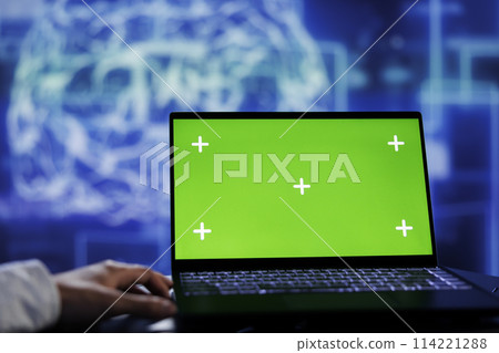 Admin using green screen device for artificial intelligence computing simulating human brain through self learning algorithms. Employee with chrome key laptop, working with AI deep neural networks Admin using green screen device for artificial intelligence computing simulating human brain through self learning algorithms. Employee with chrome key laptop, working with AI deep neural networks 114221288