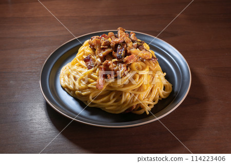 Carbonara pasta with bacon and pepper, top view Carbonara pasta with bacon and pepper, top view 114223406