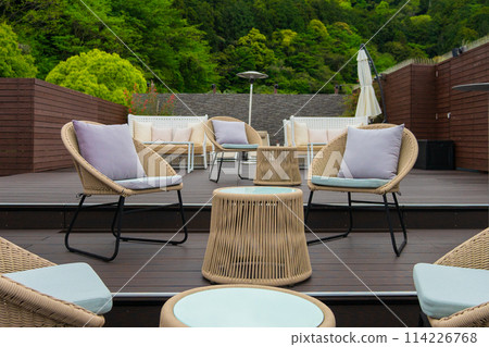 Resort hotel wooden deck chairs and sofas 114226768