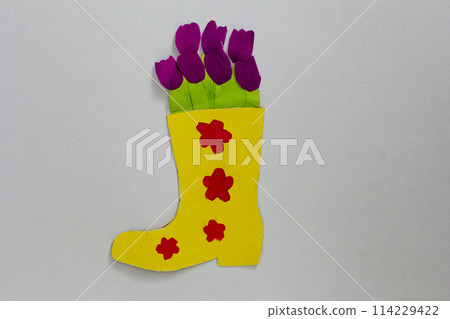 Top view of handmade boot with flowers applique on white background Top view of handmade boot with flowers applique on white background 114229422