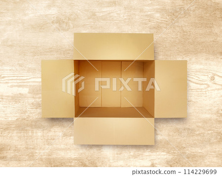 Brown blank paper box isolated on wooden background. Brown blank paper box isolated on wooden background. 114229699