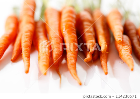 Fresh and sweet ripe orange carrot on white background 114230571