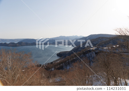 View of Lake Towada in winter and Hakko Pass No. 1 Observation Rest Area from Shimeitei Observatory (Kazuno City, Akita Prefecture) View of Lake Towada in winter and Hakko Pass No. 1 Observation Rest Area from Shimeitei Observatory (Kazuno City, Akita Prefecture) 114231031