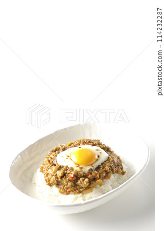 Keema curry with egg yolk and burnt cheese photographed on a white background Keema curry with egg yolk and burnt cheese photographed on a white background 114232287