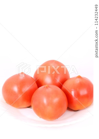 4 medium sized tomatoes on a light background 4 medium sized tomatoes on a light background 114232449
