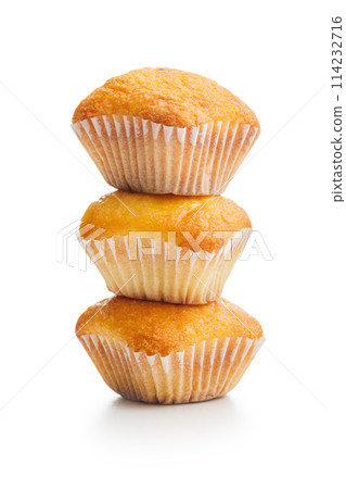Magdalenas the typical spanish plain muffins isolated on white background. Magdalenas the typical spanish plain muffins isolated on white background. 114232716