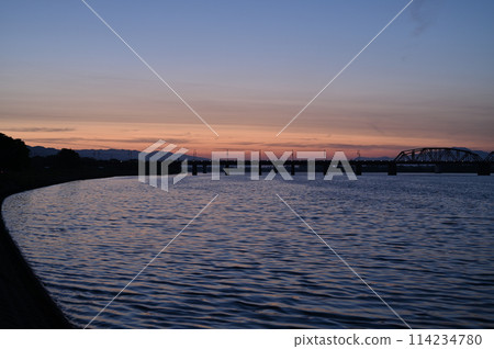 on the riverbed in the morning 114234780