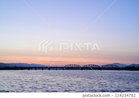 on the riverbed in the morning 114234782