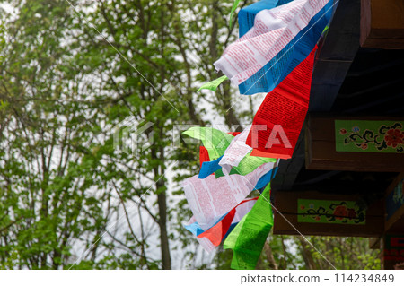 Tibetan colorful flags with prayers. Buddhism. Tibet Prayer Flag. Tibetan colorful flags with prayers. Buddhism. Tibet Prayer Flag. 114234849