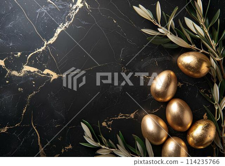Golden easter eggs with gold leaves on black marble background. Top view with copy space. Happy Easter concept  114235766