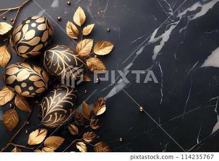 Golden easter eggs with gold leaves on black marble background. Top view with copy space. Happy Easter concept  114235767