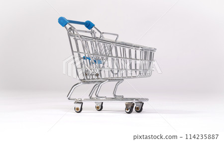 Small shopping cart isolated on solid background Small shopping cart isolated on solid background 114235887