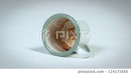 Dirty coffee mug on white background Dirty coffee mug on white background 114235888