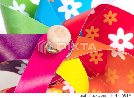 Colorful pinwheel, spinning toy with wooden stick 114235919